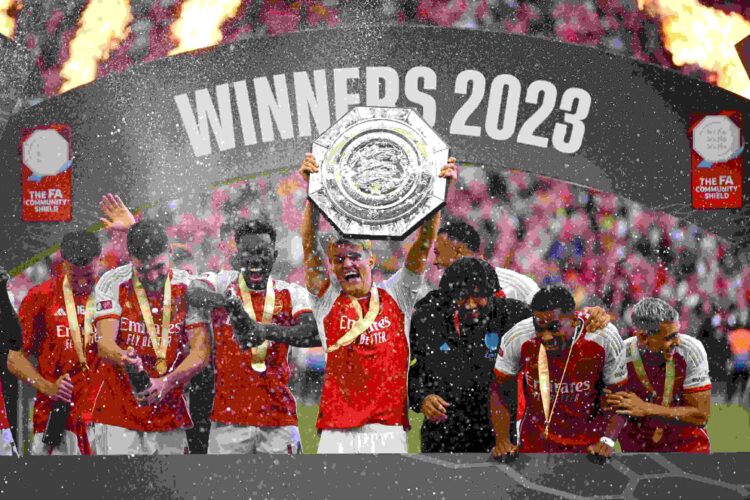 Martin Odegaard of Arsenal lifts the FA Community Shield Trophy following the team's victory in the penalty shootout during The FA Community Shield...