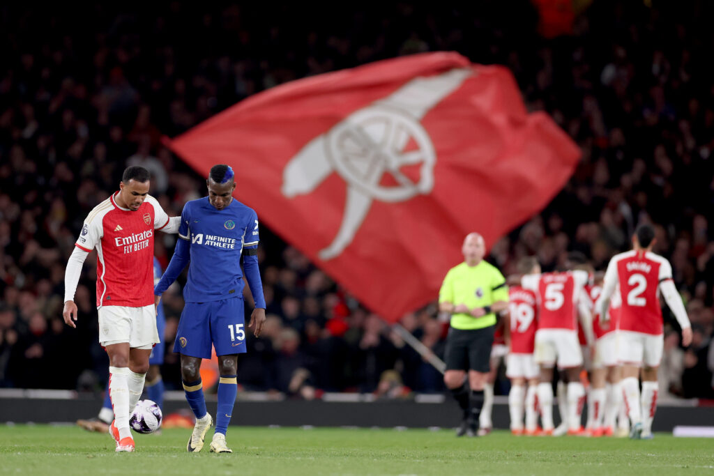 LONDON, ENGLAND - APRIL 23: Gabriel of Arsenal embraces Nicolas Jackson of Chelsea after Kai Havertz of Arsenal (hidden) scored his team's fourth goal during the Premier League match between Arsenal FC and Chelsea FC at Emirates Stadium on April 23, 2024 in London, England. (Photo by Alex Pantling/Getty Images)
