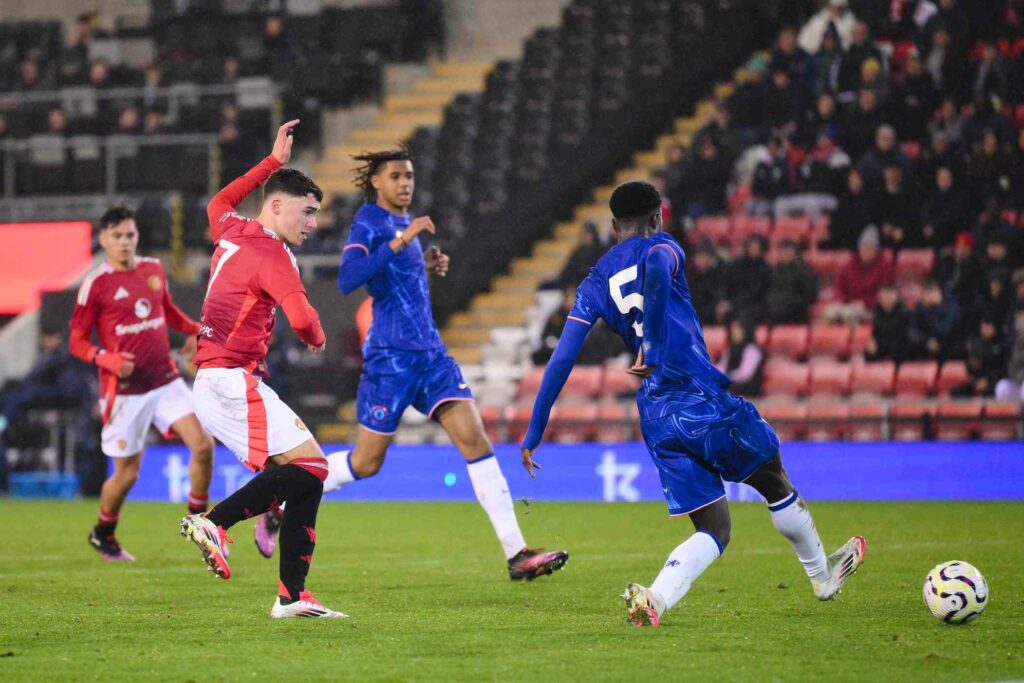 LEIGH, ENGLAND - FEBRUARY 12: James Scanlon of Manchester United scores his team's third goal during the The FA Youth Cup 5th Round match between Manchester United and Chelsea at Leigh Sports Village on February 12, 2025 in Leigh, England. (Photo by Ben Roberts Photo/Getty Images)