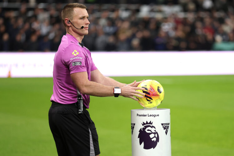 Referee Tom Bramall collects the Puma Match ball from the Premier League Plinth during the Premier League match between Newcastle United and Totten...
