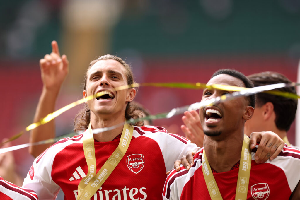 Arsenal boss delivers Odegaard prediction after City win 6 CARDIFF, WALES - AUGUST 16: Riccardo Calafiori and Gabriel Magalhaes of Arsenal celebrate after the 2026 FA Community Shield match between Arsenal and Manchester City at Principality Stadium on August 16, 2026 in Cardiff, Wales. (Photo by Carl Recine/Getty Images)