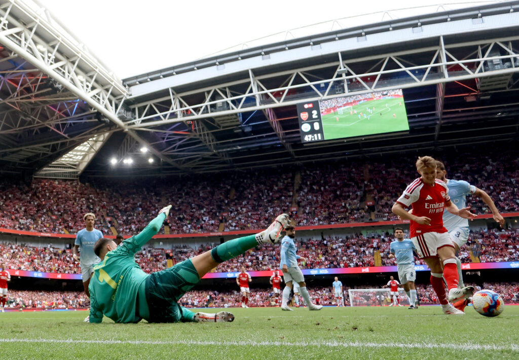 Arsenal boss delivers Odegaard prediction after City win 3 CARDIFF, WALES - AUGUST 16: Martin Odegaard of Arsenal scores his team's third goal during the 2026 FA Community Shield match between Arsenal and Manchester City at Principality Stadium on August 16, 2026 in Cardiff, Wales. (Photo by Carl Recine/Getty Images)