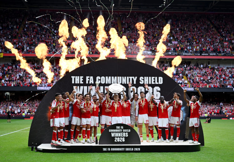 CARDIFF, WALES - AUGUST 16: Martin Odegaard of Arsenal lifts the FA Community Shield trophy with teammates after the 2026 FA Community Shield match...