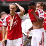 CARDIFF, WALES - AUGUST 16: Martin Odegaard and Gabriel of Arsenal celebrate following their team's victory in the 2026 FA Community Shield match between Arsenal and Manchester City at Principality Stadium on August 16, 2026 in Cardiff, Wales. (Photo by Carl Recine/Getty Images)