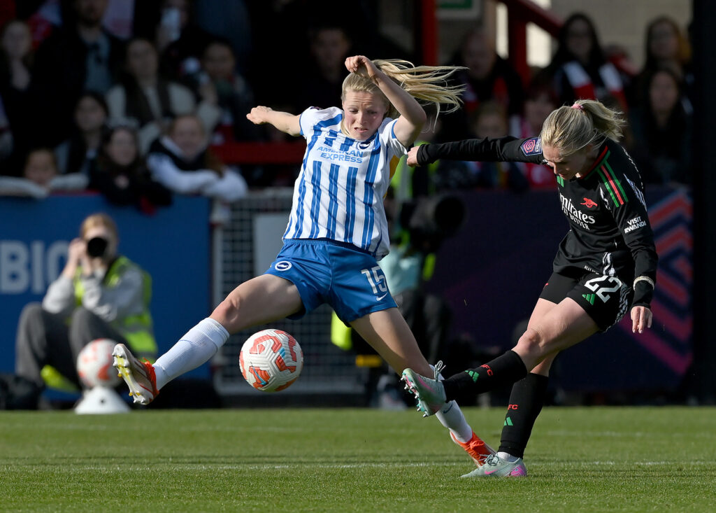 CRAWLEY, ENGLAND - MAY 05: Jenna Nighswonger of Arsenal has a shot which hits the crossbar whilst under pressure from Nadine Noordam of Brighton & Hove Albion during the Barclays Women's Super League match between Brighton & Hove Albion FC and Arsenal FC at Broadfield Stadium on May 05, 2025 in Crawley, England. (Photo by Mike Hewitt/Getty Images)