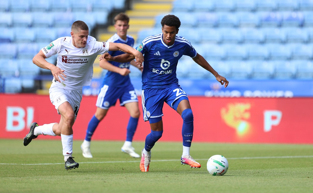 Louis Page of Leicester City looks to to move with the ball away from Joe Wormleighton of Northampton Town during the Carabao Cup first round match between Leicester City and Northampton Town at The King Power Stadium on August 08, 2026 in Leicester, England. (Photo by Pete Norton/Getty Images)
