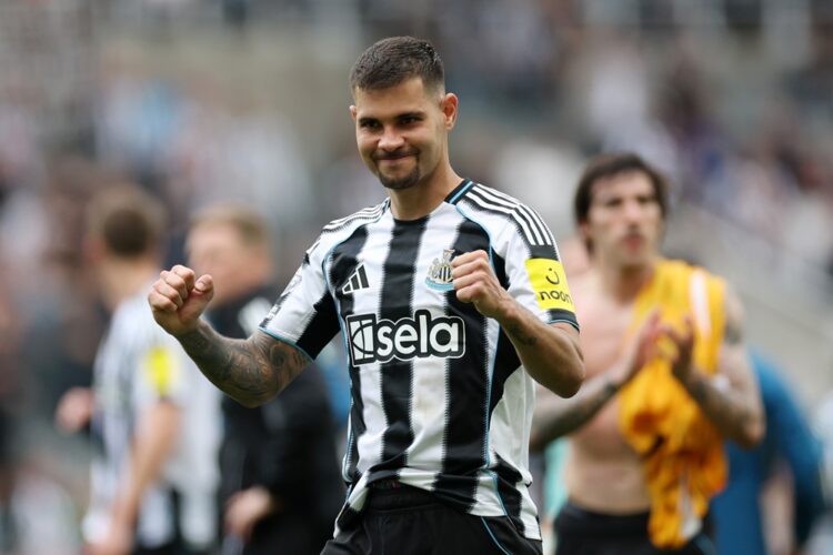Bruno Guimaraes of Newcastle United celebrates after the team's victory in the Premier League match between Newcastle United and Brighton & Hove Al...