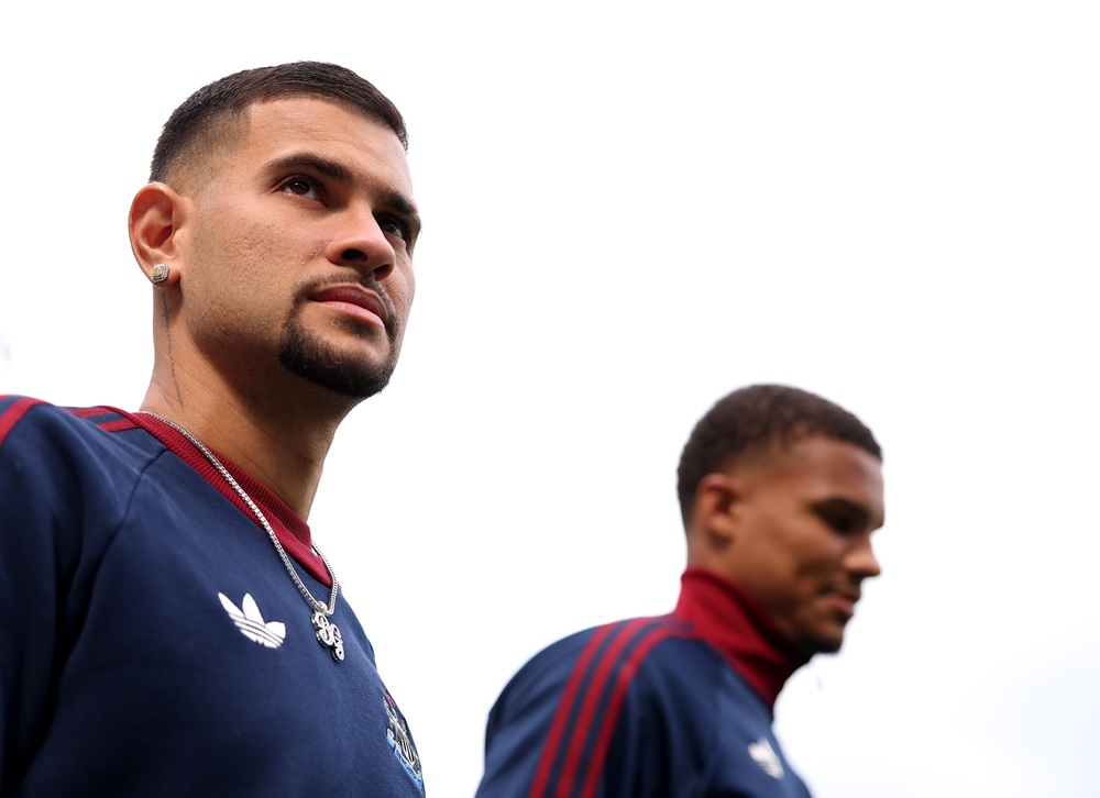 Bruno Guimaraes (L) and Malick Thiaw of Newcastle United arrive at the stadium prior to the Premier League match between Newcastle United and West ...