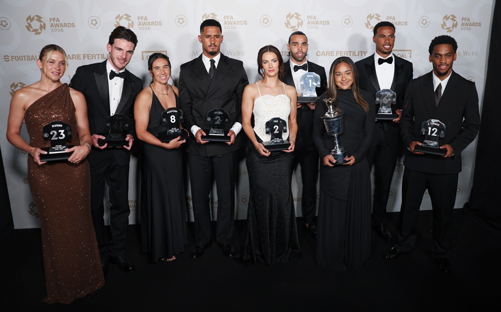 Alessia Russo, Declan Rice, Mariona Caldentey, William Saliba, Emily Fox, David Raya, Olivia Smith, Gabriel Magalhães and Jurriën Timber of Arsenal Pose with the PFA Young Player of the Year, PFA Premier League and WSL Team of the Year Awards during the 2026 PFA Awards at the Manchester Opera House on August 25, 2026 in Manchester, England. (Photo by Shane Anthony Sinclair/Getty Images)