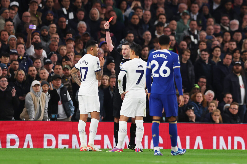 LONDON, ENGLAND - NOVEMBER 06: Referee Michael Oliver shows a red card to Cristian Romero of Tottenham Hotspur during the Premier League match between Tottenham Hotspur and Chelsea FC at Tottenham Hotspur Stadium on November 06, 2023 in London, England. (Photo by Alex Pantling/Getty Images)