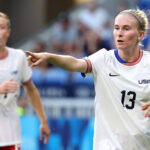 LYON, FRANCE - AUGUST 06: Jenna Nighswonger #13 of Team United States gestures to her teammates during the Women's semifinal match between United States of America and Germany during the Olympic Games Paris 2024 at Stade de Lyon on August 06, 2024 in Lyon, France. (Photo by Claudio Villa/Getty Images)