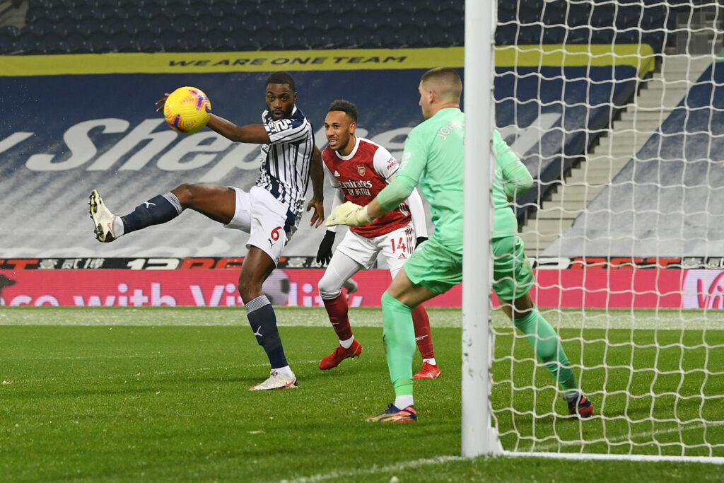 Former Arsenal youngster helps Hull shock Man United 4 WEST BROMWICH, ENGLAND - JANUARY 02: Semi Ajayi of West Bromwich Albion kicks the ball onto his own post during the Premier League match between West Bromwich Albion and Arsenal at The Hawthorns on January 02, 2021 in West Bromwich, England. The match will be played without fans, behind closed doors as a Covid-19 precaution. (Photo by Michael Regan/Getty Images)