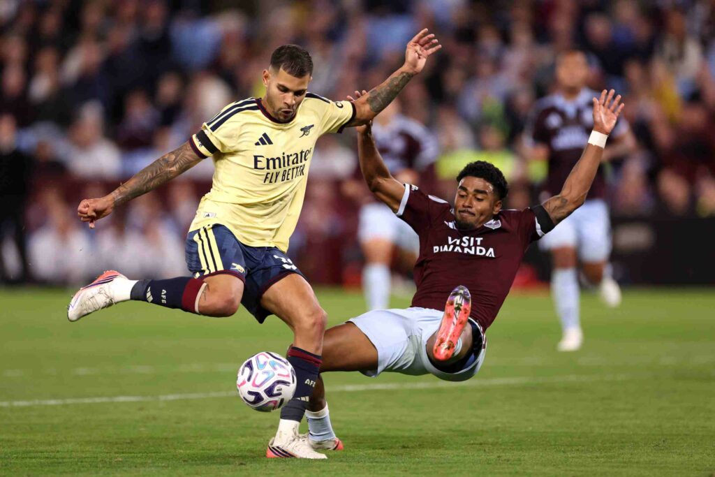 BIRMINGHAM, ENGLAND - AUGUST 31: Bruno Guimaraes of Arsenal shoots under pressure from Ian Maatsen of Aston Villa during the Premier League 2026/27 match between Aston Villa FC and Arsenal FC at Villa Park on August 31, 2026 in Birmingham, England. (Photo by Naomi Baker/Getty Images)