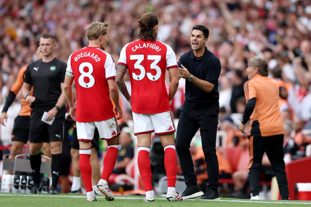 LONDON, ENGLAND - SEPTEMBER 06: Mikel Arteta, Manager of Arsenal, reacts with Martin Odegaard and Riccardo Calafiori of Arsenal during the Premier League 2026/27 match between Arsenal FC and Chelsea FC at Emirates Stadium on September 06, 2026 in London, England. (Photo by Justin Setterfield/Getty Images)