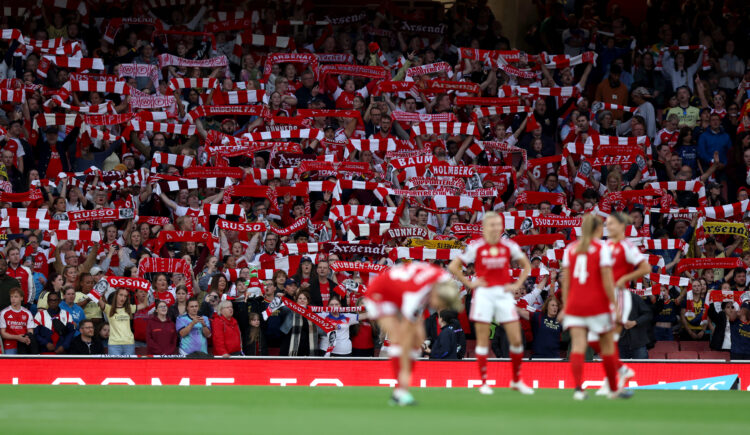 LONDON, ENGLAND - SEPTEMBER 19: Arsenal fans hold up scarfs as a show of support before the Barclays Women's Super League 2026/27 match between Ars...