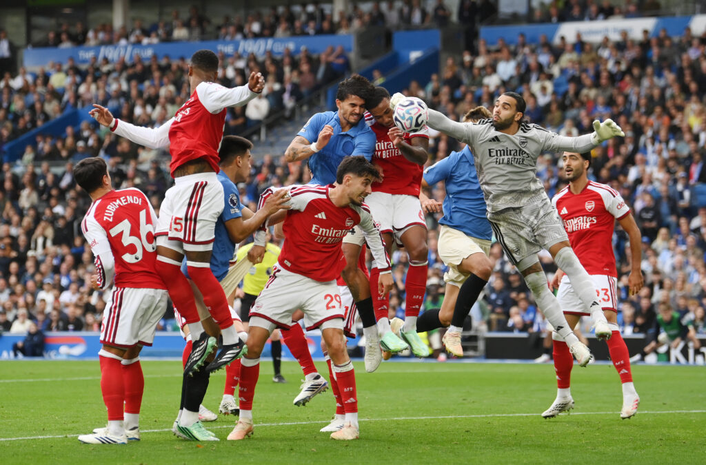 BRIGHTON, ENGLAND - SEPTEMBER 19: Pascal Struijk of Brighton & Hove Albion heads the ball wide whilst under pressure from Gabriel and David Raya of Arsenal during the Premier League 2026/27 match between Brighton & Hove Albion and Arsenal FC at American Express Stadium on September 19, 2026 in Brighton, England. (Photo by Mike Hewitt/Getty Images)