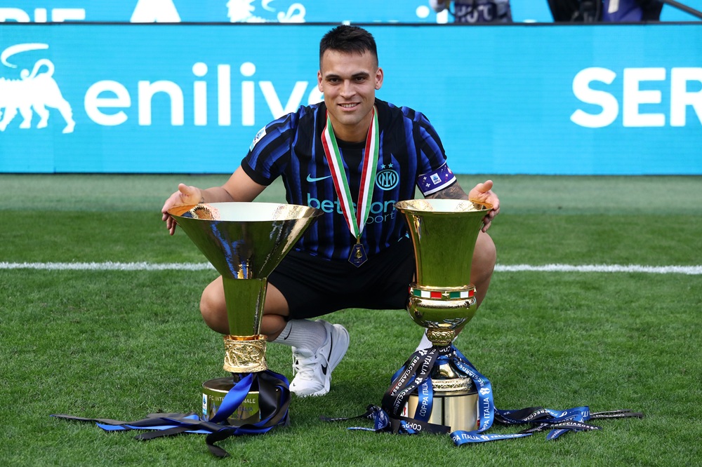 Lautaro Martinez of FC Internazionale Milano poses for a photo with the Coppa Campioni d'Italia and Coppa Italia trophies following the Serie A match between FC Internazionale and Hellas Verona FC at Giuseppe Meazza Stadium on May 17, 2026 in Milan, Italy. (Photo by Marco Luzzani/Getty Images)