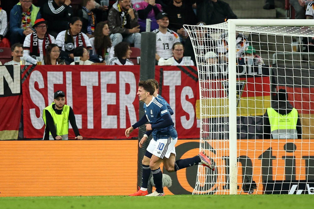 Dimitris Kourbelis of Greece celebrates scoring his team’s first goal with teammate Christos Tzolis during the UEFA Nations League 2026/27 group ph...