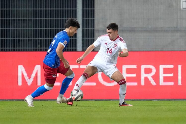 Kenny Kindle of Liechtenstein is put under pressure by James Scanlon of Gibraltar during the UEFA Nations League 2024/25 League D Group D1 match be...