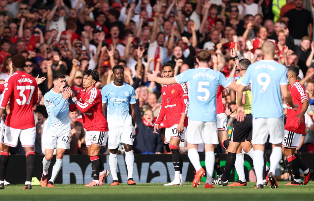 MANCHESTER, ENGLAND - SEPTEMBER 13: Phil Foden of Manchester City receives a red card from Referee Michael Oliver during the Premier League 2026/27 match between Manchester United and Manchester City at Old Trafford on September 13, 2026 in Manchester, England. (Photo by Carl Recine/Getty Images)