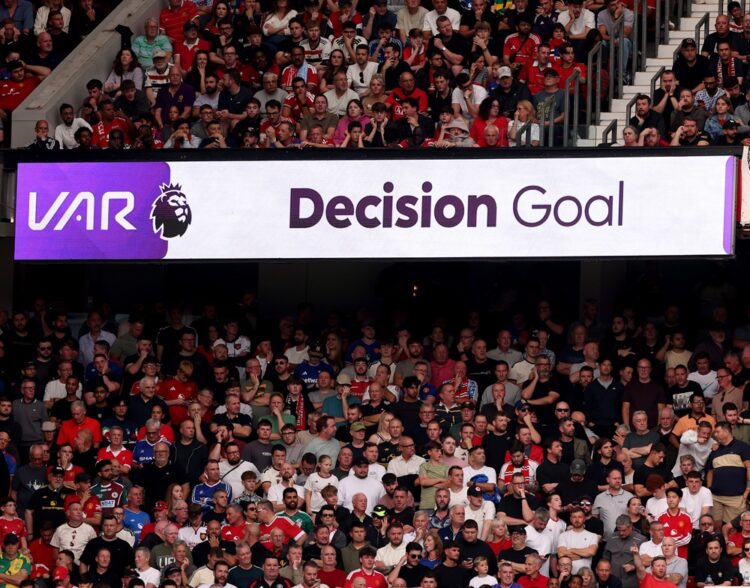 Manchester United fans react to Erling Haaland of Manchester City scoring their first goal during the Premier League 2026/27 match between Manchest...