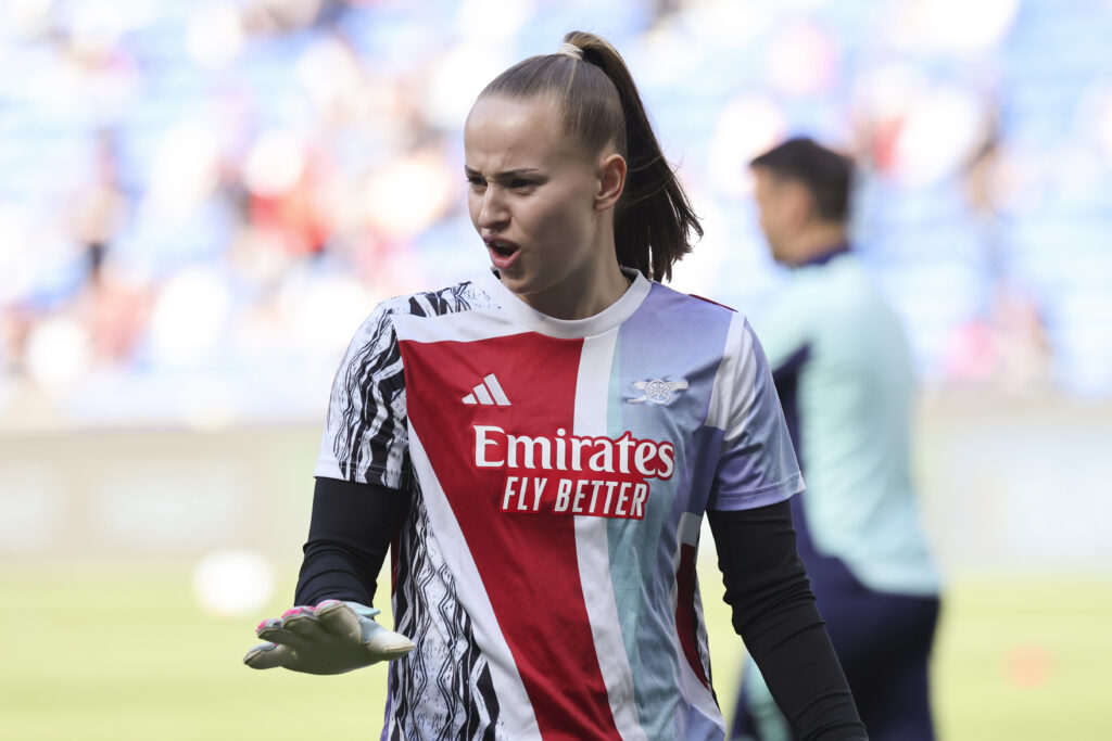 DECINES-CHARPIEU, FRANCE - APRIL 27: Daphne van Domselaar #14 of Arsenal Women FC warms up before the UEFA Women's Champions League semifinal second leg match between Olympique Lyonnais and Arsenal WFC at OL Stadium on April 27, 2025 in Decines-Charpieu, France. (Photo by Catherine Steenkeste/Getty Images)