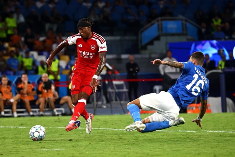 Rafa Marin of SSC Napoli competes for the ball with Noni Madueke of Arsenal FC during the UEFA Champions League 2026/27 League Phase MD1 match betw...