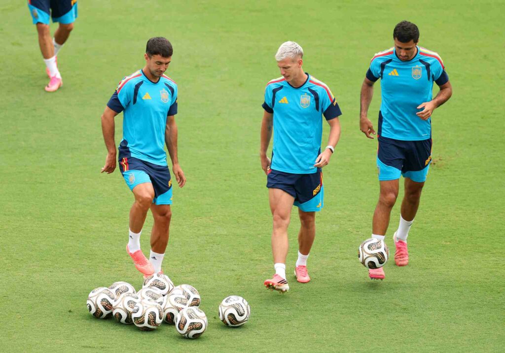 DALLAS, TEXAS - JULY 13: Martin Zubimendi #18, Dani Olmo #10 and Rodri #16 of Spain look on during a Spain Training Session at Cotton Bowl on July 13, 2026 in Dallas, Texas. (Photo by Florencia Tan Jun/Getty Images)