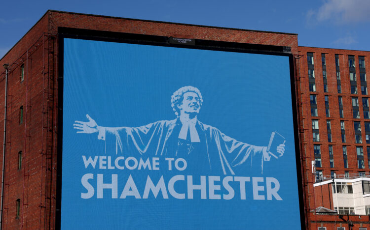 A general view of a billboard displaying the phrase "WELCOME TO SHAMCHESTER" in Manchester on October 01, 2026 in Manchester, England. The Premier ...