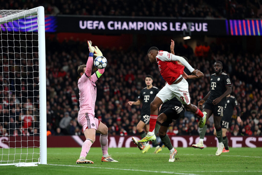 LONDON, ENGLAND - NOVEMBER 26: Cristhian Mosquera of Arsenal has a header saved by Manuel Neuer of Bayern Munich during the UEFA Champions League 2025/26 League Phase MD5 match between Arsenal FC and FC Bayern München at Arsenal Stadium on November 26, 2025 in London, England. (Photo by Richard Heathcote/Getty Images)
