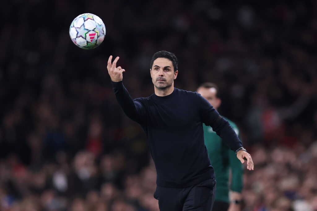 LONDON, ENGLAND - OCTOBER 13: Mikel Arteta, Manager of Arsenal, throws the match ball during the UEFA Champions League 2026/27 League Phase MD2 match between Arsenal FC and LOSC Lille at Arsenal Stadium on October 13, 2026 in London, England. (Photo by Julian Finney/Getty Images)