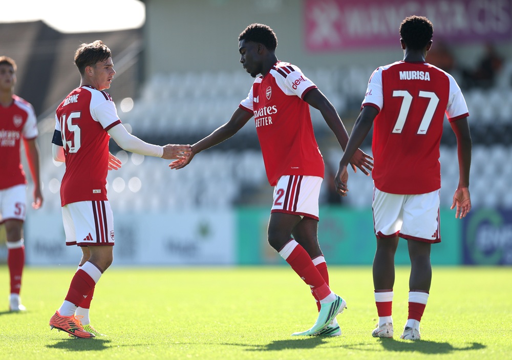 Joshua Ogunnaike of Arsenal celebrates scoring his team’s first goal with teammate Theo Julienne during the UEFA Youth League 2026/27 MD2 match between Arsenal U19 and Lille U19 at Meadow Park on October 13, 2026 in Borehamwood, England. (Photo by Julian Finney/Getty Images)