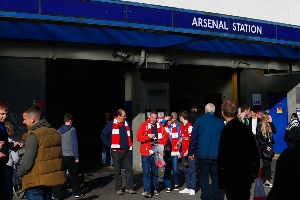 Fans arrive at Arsenal underground station ahead of the Barclays Premier League match between Arsenal and Burnley at Emirates Stadium on November 1, 2014 in London, England. (Photo by Julian Finney/Getty Images)