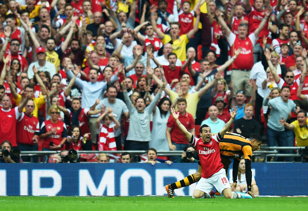 LONDON, ENGLAND - MAY 17: Santi Cazorla of Arsenal and Arsenal fans appeal during the FA Cup with Budweiser Final match between Arsenal and Hull City at Wembley Stadium on May 17, 2014 in London, England. (Photo by Shaun Botterill/Getty Images)