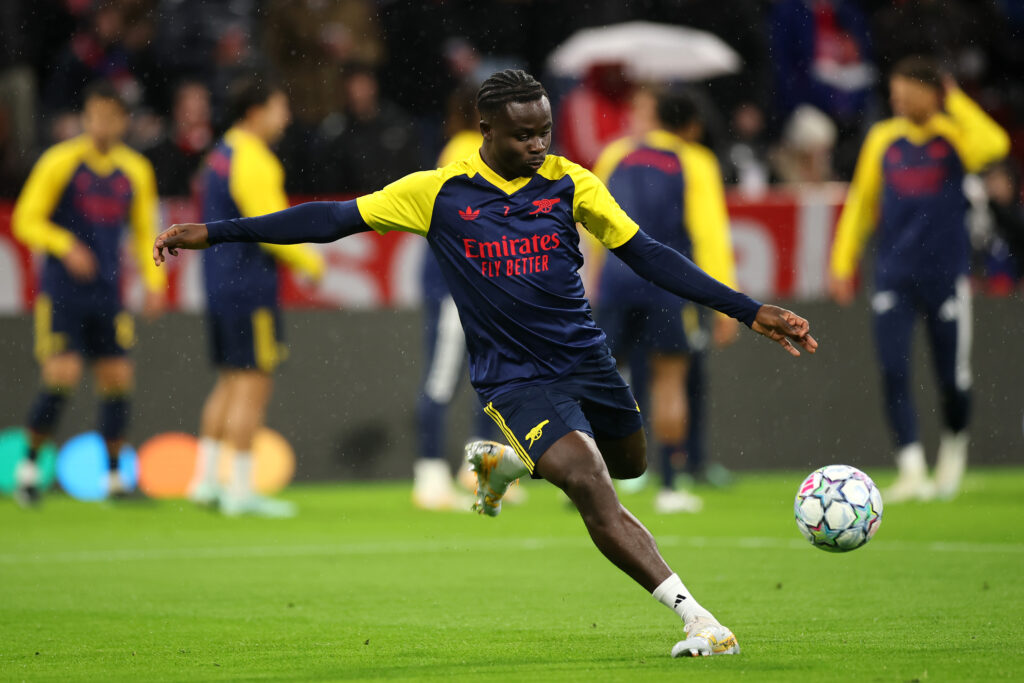 MUNICH, GERMANY - OCTOBER 21: Bukayo Saka of Arsenal warms up before the UEFA Champions League 2026/27 League Phase MD3 match between FC Bayern München and Arsenal FC at Football Arena Munich on October 21, 2026 in Munich, Germany. (Photo by Alex Grimm/Getty Images)