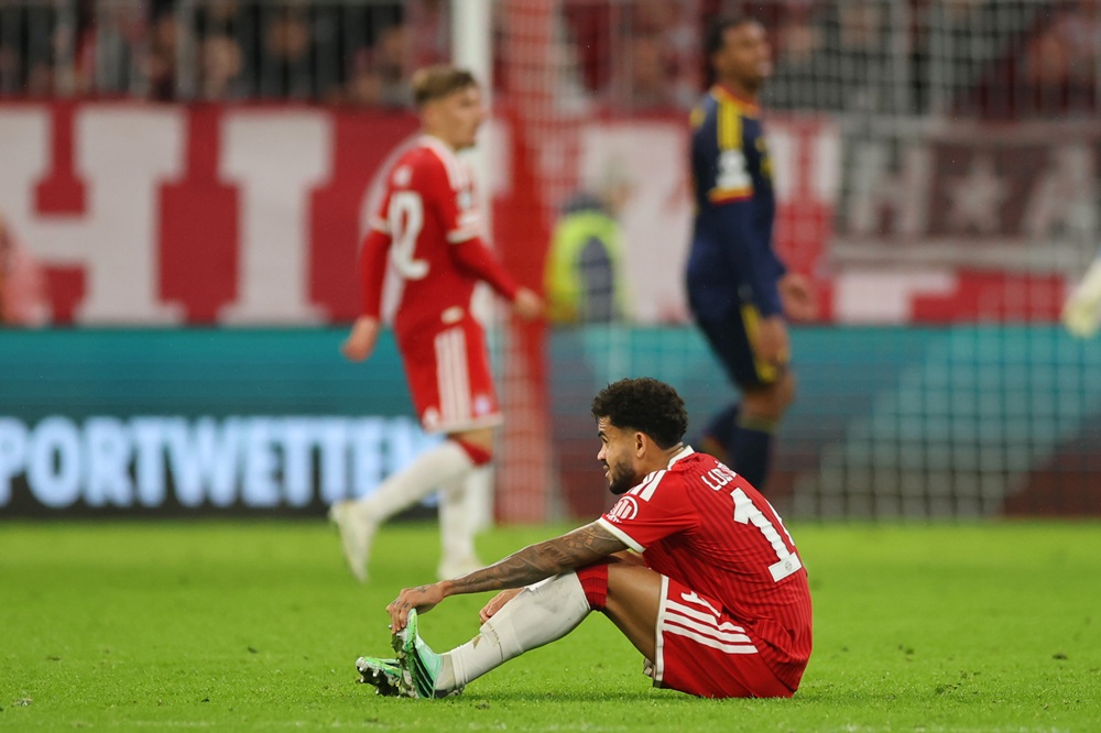 Luis Diaz of FC Bayern Muenchen reacts after sustaining an injury during the UEFA Champions League 2026/27 League Phase MD3 match between FC Bayern München and Arsenal FC at Football Arena Munich on October 21, 2026 in Munich, Germany. (Photo by Alex Grimm/Getty Images)