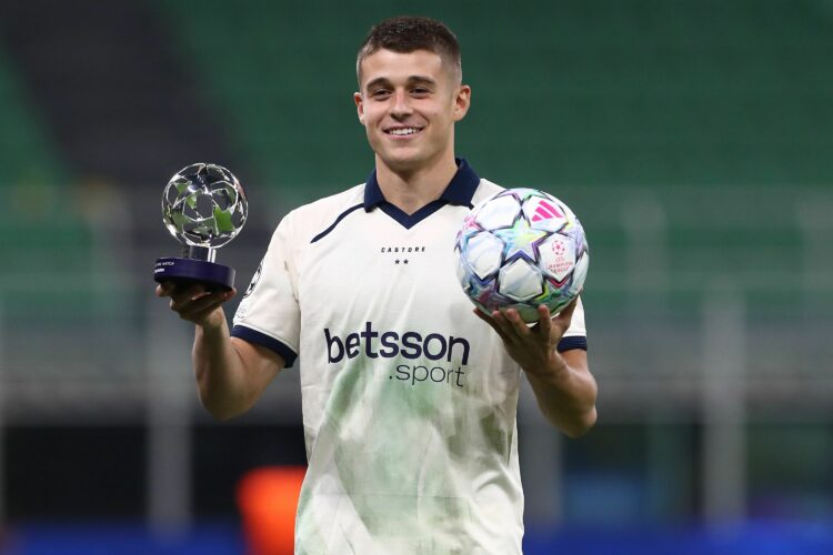 MILAN, ITALY - OCTOBER 13: Nicolo Tresoldi of Club Brugge KV poses for a photo with the PlayStation Player of the Match award and the match ball af...
