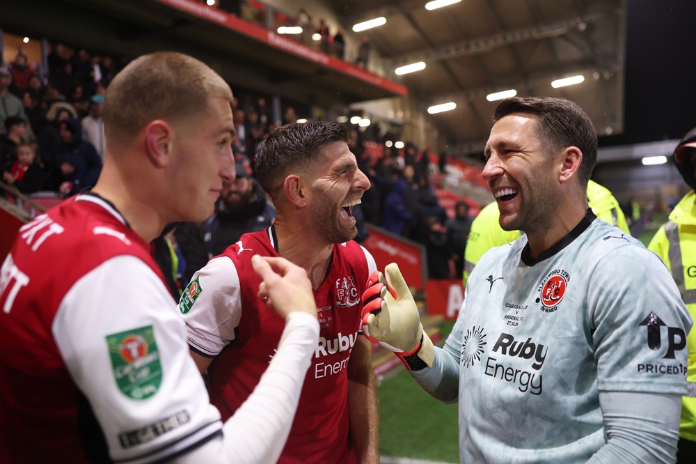 Jay Lynch of Fleetwood Town celebrates with teammates after the Carabao Cup Fourth Round match between Fleetwood Town and Arsenal at Highbury Stadium on October 27, 2026 in Fleetwood, England. (Photo by Carl Recine/Getty Images)