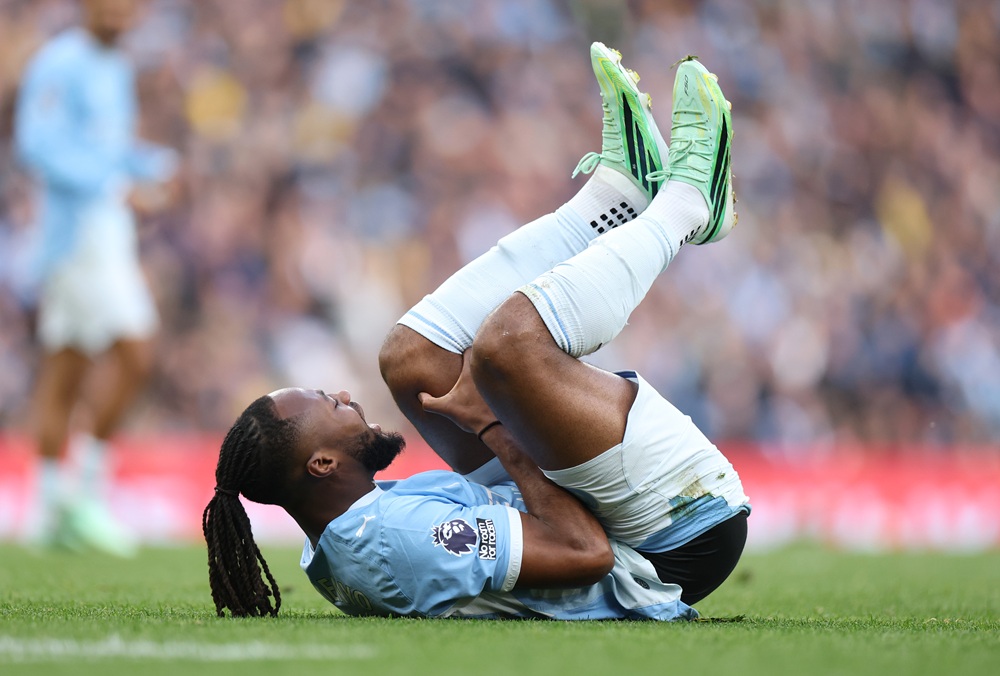 Antoine Semenyo of Manchester City holds his leg after picking up an injury during the Premier League 2026/27 match between Manchester City and Ips...