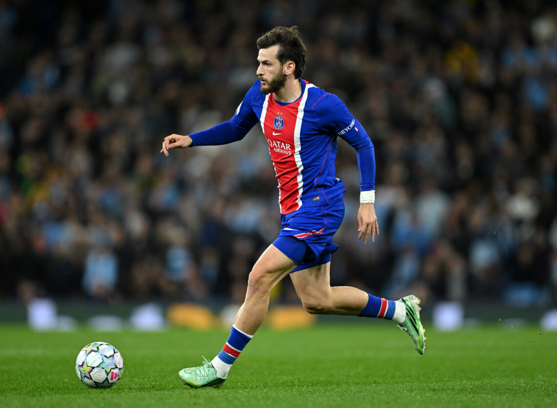 MANCHESTER, ENGLAND - OCTOBER 14: Khvicha Kvaratskhelia of Paris Saint-Germain runs with the ball during the UEFA Champions League 2026/27 League P...