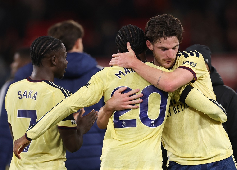 Declan Rice and Noni Madueke of Arsenal embrace after the Premier League 2026/27 match between Nottingham Forest FC and Arsenal FC at City Ground on October 18, 2026 in Nottingham, England. (Photo by Carl Recine/Getty Images)