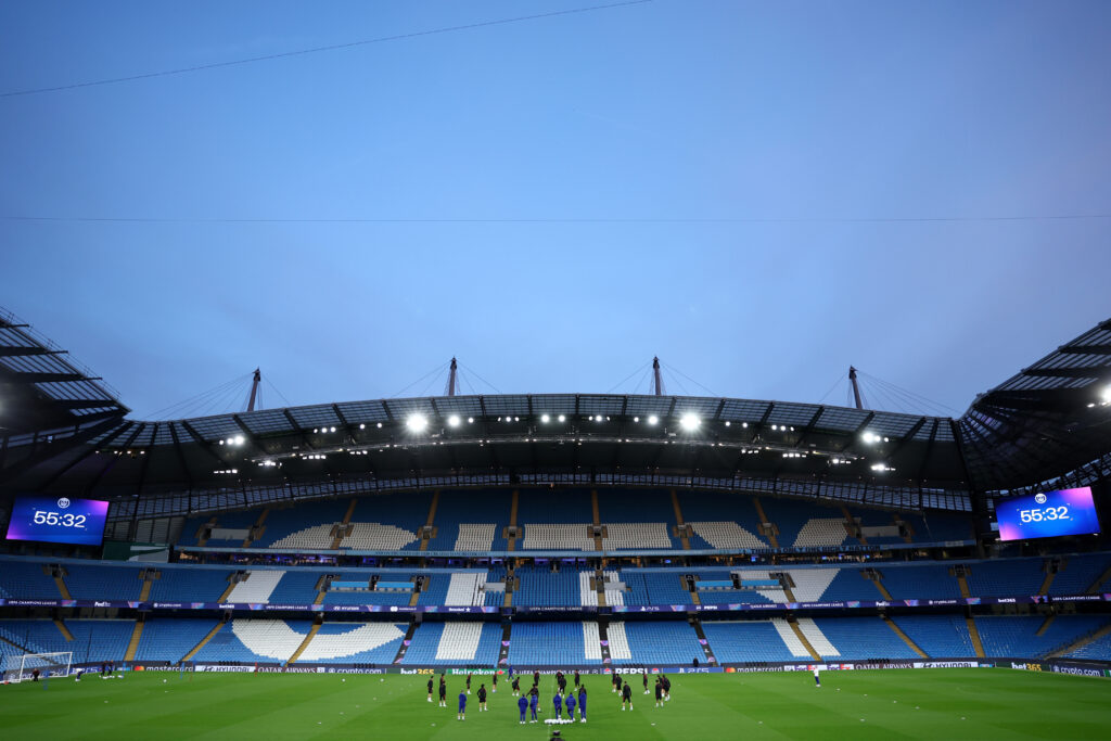 MANCHESTER, ENGLAND - OCTOBER 13: General view inside the stadium as players and staff of Paris Saint-Germain are on the pitch during the training session one day ahead of the UEFA Champions League 2026/27 League Phase MD2 at City of Manchester Stadium on October 13, 2026 in Manchester, England. (Photo by Molly Darlington/Getty Images)