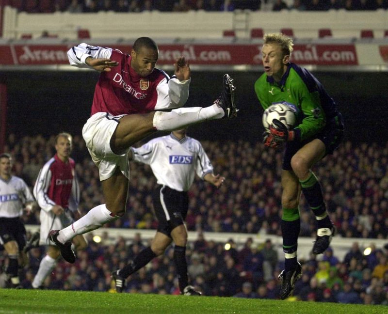 11 Nov 2000: Thierry Henry of Arsenal is foiled by Martin Poom of derby during the Aresnal v Derby County FA Carling Premiership match at Highbury, Arsenal, London. Digital image. Mandatory Credit: Ross Kinnaird/ALLSPORT