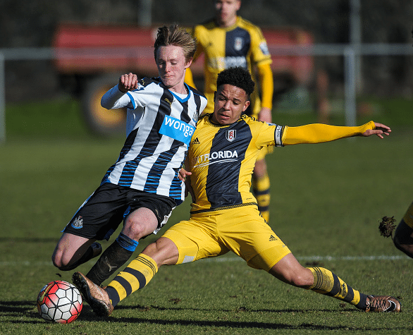 Sean Longstaff (L) of Newcastle is challenged by Joshua Smile (R) of Fulham for the ball during The Barclays Under 21 Premier League match between Newcastle United and Fulham at Whitley Park on February 22, 2015, in Newcastle upon Tyne, England. | Credit: Serena Taylor
