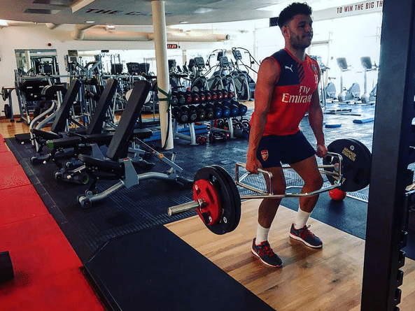 Alex Oxlade-Chamberlain (pictured) in the gym, completing his rehabilitation work. | Image: Instagram