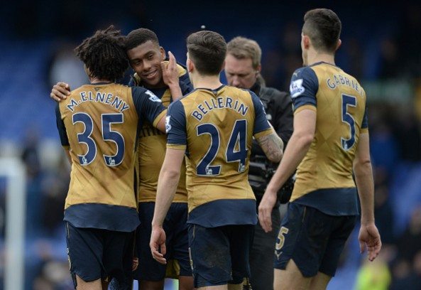Arsenal players (L-R) Arsenal's Egyptian midfielder Mohamed Elneny, Arsenal's Nigerian striker Alex Iwobi, Arsenal's Spanish defender Hector Bellerin and Arsenal's Brazilian defender Gabriel celebrates after the English Premier League football match between Everton and Arsenal at Goodison Park in Liverpool, north west England on March 19, 2016.   Arsenal won the game 2-0. / AFP / OLI SCARFF / RESTRICTED TO EDITORIAL USE. No use with unauthorized audio, video, data, fixture lists, club/league logos or 'live' services. Online in-match use limited to 75 images, no video emulation. No use in betting, games or single club/league/player publications.  /         (Photo credit should read OLI SCARFF/AFP/Getty Images)