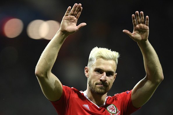 Wales' midfielder Aaron Ramsey, who scored the team's first goal, celebrates their 3-0 win in the Euro 2016 group B football match between Russia and Wales at the Stadium Municipal in Toulouse on June 20, 2016. / AFP / MARTIN BUREAU (Photo credit should read MARTIN BUREAU/AFP/Getty Images)