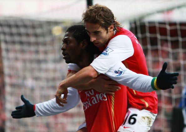 LONDON - JANUARY 12: Emmanuel Adebayor and Mathieu Flamini of Arsenal celebrate Adebayor's penalty during the Barclays Premier League match between Arsenal and Birmingham City at Emirates Stadium on January 12, 2008 in London, England.  (Photo by Clive Mason/Getty Images)