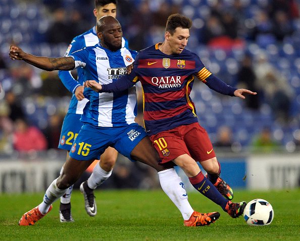 Barcelona's Argentinian forward Lionel Messi (R) vies with Espanyol's French defender Michael Ciani (L) during the Spanish Copa del Rey (King's Cup) round of 16 second leg football match RCD Espanyol vs FC Barcelona at Cornella-El Prat stadium in Cornella near Barcelona, on January 13, 2016. AFP PHOTO/ LLUIS GENE / AFP / LLUIS GENE (Photo credit should read LLUIS GENE/AFP/Getty Images)