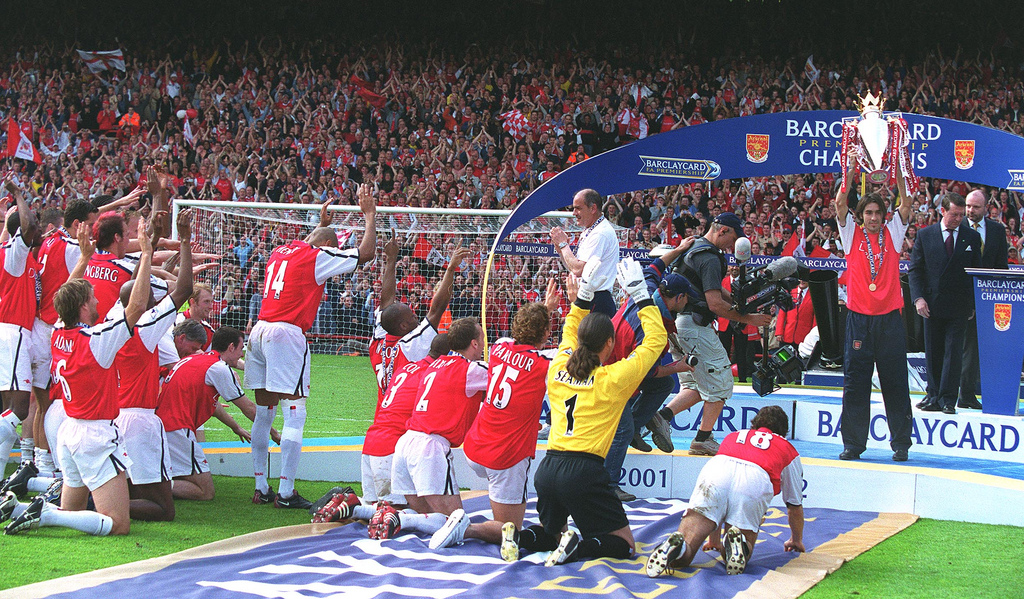 The Arsenal first team squad acclaim Robert Pires at the end of the 2002 season. Photo by Stuart MacFarlane